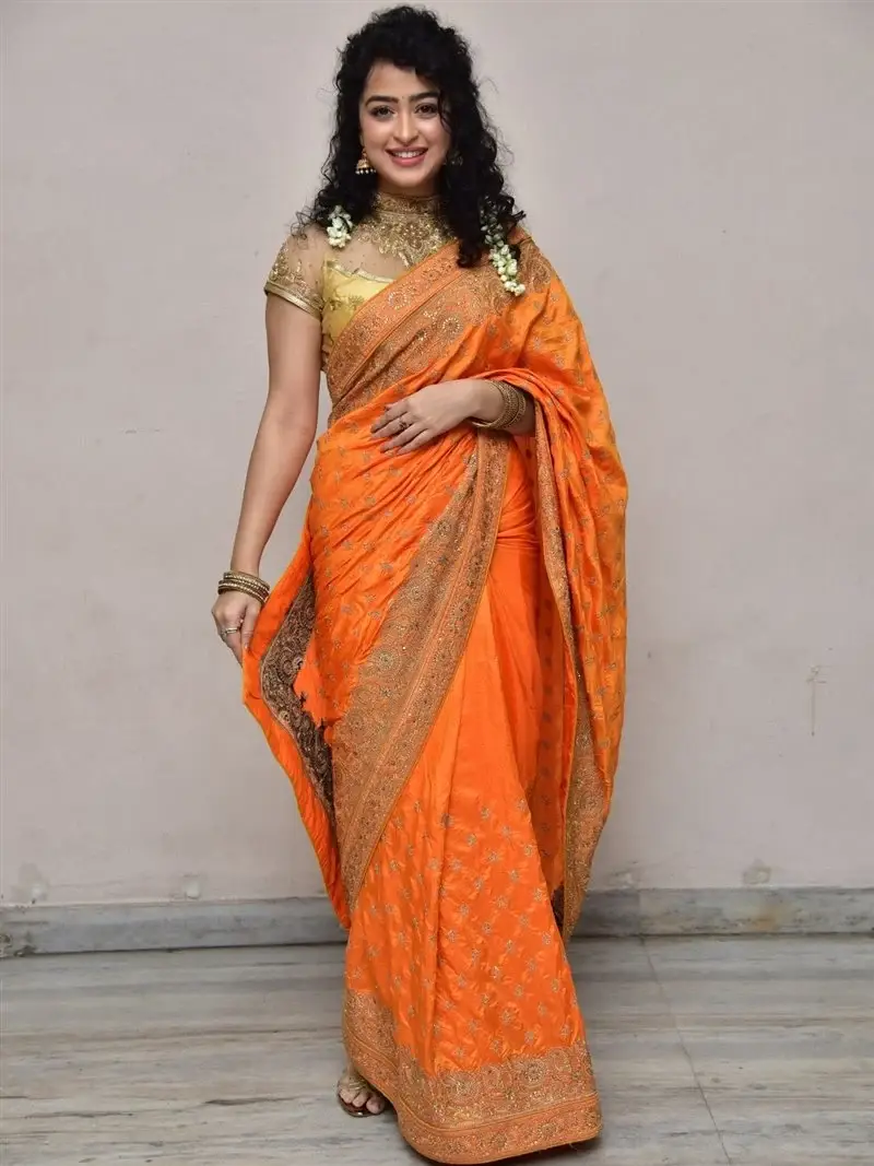 Actress Apsara Rani in Orange Saree at Talakona Movie Launch